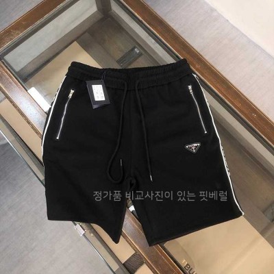 [국내배송] 프*다 삼각로고 하프팬츠