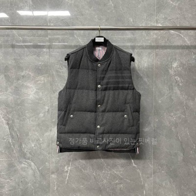 톰*라운 플란넬 다운 필 사선 베스트 패딩 조끼